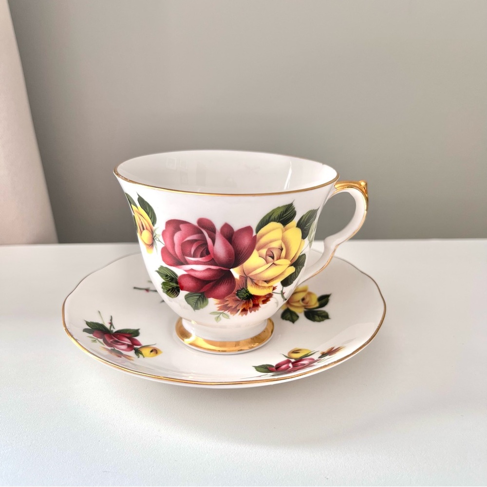 Queen Anne floral  Teacup and Saucer with Gold Trim